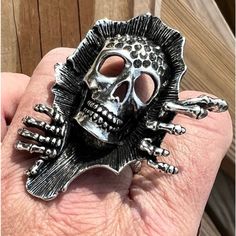 Antique Silver Skull With Bling Creeping Out At You On Your Ring! Skeleton Hands Are Pushing Out On Ring As Well. Ring Face Is 2 1/8 Inches Tall And 1.75 Inch Wide. Elastic One Size Fits All Band. Antique Gold Shown For Style Only. New From Package. All Measurements Are Approximate. Antique Silver Rings, All Band, Skeleton Hands, Womens Jewelry Rings, One Size Fits All, Antique Gold, Antique Silver, Silver Rings, Women Jewelry