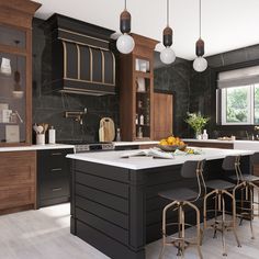 a kitchen with black cabinets and white counter tops, two stools at the island