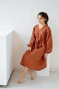 "READY TO SHIP S size Terracotta linen V-neck long sleeved dress. Dress with pockets and long belt. Creating this collection I was thinking, first of all, about comfort and feelings of those who would wear it. Natural softened linen, well-considered details and good quality of seams - this is exactly what will help your body to feel taken care of. For stitching parts, I never use an overlock, all internal seams are French (double). This fabric is certified Oeko-Tex Standard 100 03.0.4362. The dr Chic Linen Midi Dress For Fall, Fall Linen Dress For Workwear With Relaxed Fit, Fall Linen Dress Relaxed Fit For Work, Relaxed Fit Linen Dress For Fall Workwear, Chic Long Sleeve Linen Dress With Pockets, Linen Midi Dress For Work In Fall, Fall Linen Midi Dress With Relaxed Fit, Linen Relaxed Fit Midi Dress For Fall, Midi Linen Dress For Fall