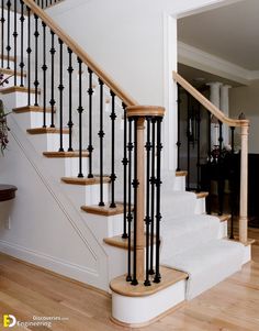 the stairs in this house are made of wood and wrought iron