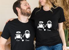 "Personalized Wall-E Characters Couples Shirt, Gift For Her, Eve And Wall-E Valentine's Day Shirts , Valentines Day Gifts, Your Name On Shirt ---How To Order --- 1-) Please, check and review all photos 2-) Choose your t-shirt size and color 3-) Write your design color and year in personalization box 4-) Click add to cart. You can go back to add more product 5-)Click \"Proceed to check out\" 6-)When you check out, you can add a note to seller for any request SIZE AND COLORS: For sizing details an Walle Y Eva, Eve Outfit, Valentines Day Gifts, Wall E, Personalized Wall, Valentines Day Shirts, Couple Shirts, Design Color, Your Name