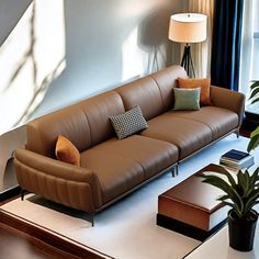 a living room filled with furniture next to a window and a lamp on top of a table