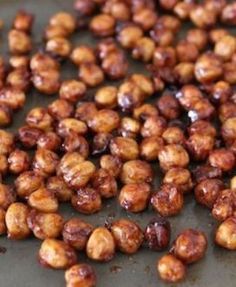 roasted nuts on a baking sheet ready to be cooked