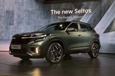 the new seltros suv is displayed at an event in front of a wall