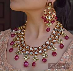 VeroniQ Trends-Replica Sabyasachi Designer Kundan/Polki Necklace Set very High Quality Faux Ruby Gems- D2- Bridal,Wedding.,Wedding,Engagement,Royal,Party,Sabyasachi Each piece of VeroniQ Trends jewellery is expertly crafted and loving hand-finished by VeroniQ Trends talented crafts people, who bring the jewellery to life with meticulous attention to detail, skilfully setting sparkling stones or applying colourful enamel by hand.  The material used to create VeroniQ Trends Jewellery are of highest quality and each hand finished piece goes through a vigorous quality control process to ensure it lives up to impressive standards that define VeroniQ Trends. It is advisable to avoid contact with water and organic chemicals i.e. perfume sprays. Store jewellery in airtight box. After use, wipe the Red Kundan Necklace, Red Jewellery Set, Kundan Polki Necklace, Sabyasachi Designer, Designer Jewelery, Polki Necklace Set, Pearl Neck, Gold Jhumka, Silver Jewelry Accessories