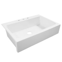 a white sink sitting on top of a counter