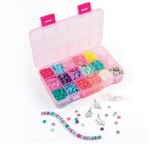 a pink case filled with lots of different colored beads