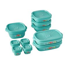 a set of blue plastic containers with flower designs on the lids and four smaller bowls