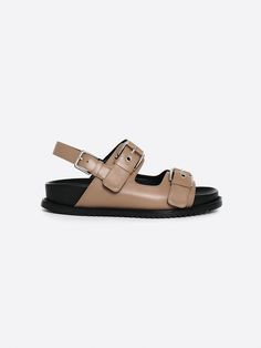 Editor's NotesRareness' shoes are designed for comfortable and basic styles.- Bold buckled double strap sandals- Cushioned sole bottom- Subtle glossy leather- Easy slide-in design- Modern almond toe shapeMeasurements(in.)- Size: KR 225MM (US 5.5) ~ KR 250MM (US 8)- Heel Height: 1.2 in.*Fits true to size.Composition & Care- Calf Leather- Lining: Pigskin Leather- Insole: Kidskin Leather- Avoid direct heat and moisture- Professional cleaning is recommendedDesigner- by rareness Modern Sandals With Leather Footbed And Rectangular Buckle, Modern Double Strap Footbed Sandals With Buckle Closure, Modern Footbed Sandals With Buckle Closure And Open Heel, Modern Footbed Sandals With Buckle And Open Heel, Modern Leather Footbed Sandals With Tang Buckle, Modern Double Strap Footbed Sandals With Adjustable Strap, Modern Sandals With Double Strap And Tang Buckle, Modern Double Strap Sandals With Tang Buckle, Modern Double Strap Slides With Buckle Closure