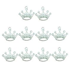 six silver crowns with pearls on the sides and one tiable in the middle, set of 6