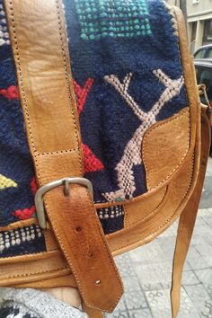 "Welcome! A kilim shoulder bag Material: leather Some signs of use (some stain, imperfecto on and small hole un strap that needs sew) but in good condition. Interior needs some restauration. Strong Material. Really good quality leather. Adjustable Straps. Measures: 11.41\" (29 cm) x 9.05\" (23 cm) Straps: 45.66\" (116 cm) Thanks for stopping by!!IMPORTANT: Due to the delicate situation We're all going through, and in order to keep the safety of courier workers too, all orders will be dispatched Bohemian Saddle Shoulder Bag For Travel, Bohemian Shoulder Bag With Leather Trim, Bohemian Saddle Bag With Leather Handles For Everyday Use, Bohemian Saddle Bag With Adjustable Strap, Bohemian Satchel Saddle Bag For Travel, Brown Bohemian Saddle Bag For Travel, Bohemian Saddle Bag Satchel With Adjustable Strap, Bohemian Satchel Saddle Bag With Adjustable Strap, Bohemian Saddle Bag With Adjustable Strap For Daily Use