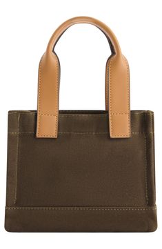 The iconic logo patch adds a well-traveled finish to a versatile canvas mini tote bag featuring a squared base for maximum interior space. 8" H x 7" W x 4" D 19-29" strap drop Dual top handles, optional crossbody strap Magnetic top closure Textile Lined Imported Brown Rectangular Canvas Bag With Top Carry Handle, Square Coated Canvas Satchel For Travel, Square Coated Canvas Travel Satchel, Square Canvas Bag With Dust Bag For Everyday Use, Square Canvas Satchel With Leather Handles, Rectangular Canvas Shoulder Bag With Reinforced Handles, Square Canvas Satchel With Handles, Canvas Rectangular Satchel With Handles, Rectangular Canvas Bag With Handles