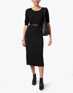 Simple and understated, Eileen Fisher's versatile black dress boasts long lines and a slim fit. The stretchy jersey knit fabrication ensures that it's just as comfortable as it is stylish. We recommend adding a slim belt to define the midi-length silhouette and pairing it with a leather handbag. Black Fitted Midi Belted Dress, Eileen Fisher Outfits, Black Ruffled Dress, Painted Pianos, Skirt And Top Dress, Comfy Travel, Womens Winter Fashion Outfits, Stretch Knit Dress, Slimmer Belt