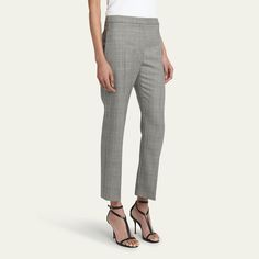 Alexander McQueen Prince of Wales trousers Cropped length High rise Side slip pockets; back welt pocket Straight legs Tab/zip fly Wool Made in Italy