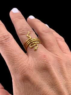 Adjustable Stainless steel gold ring. It doesn't change color with use. very resistant to erosion. USA size 6-7.5 Minimalist Gold Snake-shaped Jewelry, Minimalist Gold Snake Jewelry, Gold Snake Ring As Gift, Gold Minimalist Snake Ring For Promise, Adjustable Gold Snake Ring, Gold Minimalist Snake Ring As Promise Ring, Gold Open Snake Ring, Dainty Gold Snake-shaped Jewelry, Dainty Gold Snake Jewelry