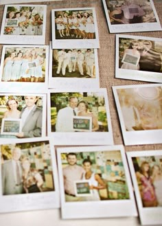 many polaroid photos are arranged on the table