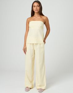 These tie waist pants feature a relaxed leg style and a mid rise fit. Spring Wide Leg Ankle-length Pants With Tie Waist, Spring Ankle-length Wide Leg Pants With Tie Waist, Wide-leg Tie Waist Loungewear Bottoms, Wide-leg Pants With Tie Waist For A Day Out, Straight Leg Bottoms With Tie Waist And Relaxed Fit, Spring Wide Leg Tie Waist Pants, Cotton Wide Leg Pants With Tie Waist For Loungewear, Relaxed Fit Straight Leg Bottoms With Tie Waist, Wide Leg Pants With Tie Waist For Loungewear