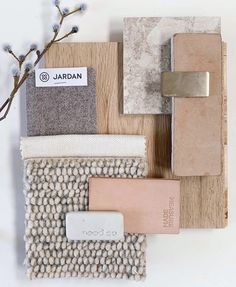 various materials are arranged on top of each other, including fabric and wood pieces with the name jardan printed on them