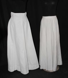 "TWO PLAIN LONG LINEN SKIRTS, LATE 1920s This lot contains two linen skirts dating to the late 1920s and early 1930s. All have recently been laundered and pressed. LEFT TO RIGHT THE LEFT SKIRT White linen plain skirt with multiple panels to produce fullness. High Waist. Back metal closure using  5 snaps and 6 hook and eyes. Unlabeled. CONDITION Very Good.  No holes, no repairs , has stain on lower back, and has been laundered and pressed. APPROXIMATE MEASUREMENTS Waist: 33\", narrows to 31\", 3- Fitted Linen Skirt For Formal Occasions, Vintage Formal Full Skirt Bottoms, Fitted Linen Formal Skirt, Formal Fitted Linen Skirt, Linen Fitted Skirt For Daywear, Fitted Linen Skirt For Daywear, Fitted Lined Bottoms For Daywear, Classic Cotton Skirt For Daywear, Fitted Full Length Skirt For Daywear