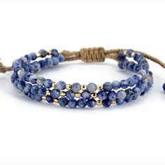 Not only does the Handmade Natural Sodalite and Gold Bead Stack Bracelet look great, it makes the perfect gift for someone. Sodalite brings order and calmness to the mind and is an excellent stone for anyone on the path for truth and discovery. Called the Logic Stone, it inspires awakening, deep thought and helps to clear the mind. It promotes Confidence, Communication and Creativity. It benefits the Throat Chakra with communication and expression of creativity - feeling comfortable to express y Sodalite Bracelet, Stack Bracelet, Deep Thought, Beaded Wrap Bracelets, Beaded Wraps, Stackable Bracelets, Strand Bracelet, Nature Bracelets, Blue Gemstones