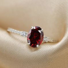 Beautifully handmade Garnet ring. The perfect cocktail ring set with a red gemstone and simulant diamonds Elegant, classy and vintage inspired. Available in Gold plating, Rose Gold plating and in Sterling Silver ☆ WHY THIS PIECE OF J E W E L R Y IS AWESOME! ☆ * Hand finished and made from high quality raw materials. * Long lasting beauty & Timeless design * Beautifully made, hand finished, Fast shipping with tracking amazing after sales service if needed. * Garnet oval cut 8x6 mm 1.25 ctw wi Ring For Women Silver, Red Gemstone Ring, Etsy Gold Ring, Diamond Gift, Textured Ring, Oval Ring, Red Gemstones, Diamond Simulant, Garnet Ring