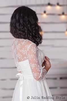 .This amazing, gentle and very feminine and can become a special  to your wedding dress ! It will compliment any  dress, cocktail dress or evening gown. It will be perfect also for your bridesmaids.Made with  beautiful lace and sequins.Available color white.This bolero measures approximately 12"-13" from the base of your neck down the center back.Bust 34"-35".3/4 sleeve--17 inch.    Care instructions: Hand wash, cold water, no bleach, rinse well and promptly remove.        For best results, hand Fitted Lace Shrug With Lace Trim, Wedding Lace Top With Sheer Long Sleeves, Long Sleeve Lace Shrug With Lace Trim, Fitted Long-sleeve Wedding Shrug, Long Sleeve Lace Shrug For Party, Long Sleeve Lace Wedding Shrug, Lace Long Sleeve Wedding Shrug, Long Sleeve Lace Shrug For Wedding, Lace Bolero Jacket