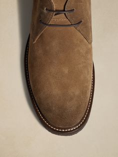 Designed for adventure, this ultra-versatile chukka-style boot has a distinctive crepe sole and luxurious suede construction that gets better with every wear.  Designed with lightweight, durable OrthoLite® performance insoles for breathable cushioni Walking Chukka Boots With Vibram Sole And Plain Toe, Chukka Boots With Vibram Sole For Walking, Plain Toe Chukka Boots With Vibram Sole For Walking, Classic Chukka Boots With Vibram Sole For Outdoor, Classic Waterproof Suede Ankle Boots, Classic Suede Work Boots With Suede Lining, Classic Work Boots With Suede Lining, Outdoor Brown Suede Chukka Boots, Outdoor Chukka Boots With Rubber Sole And Plain Toe