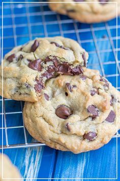 two chocolate chip cookies on a cooling rack