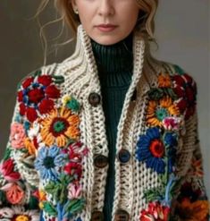 a woman wearing a multicolored jacket with flowers on it