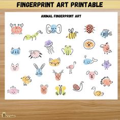 the fingerprint art printable is displayed on a wooden surface with an image of animals and