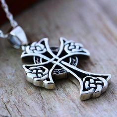 "This symbol has been used by Christians as a sign of the Blessed Trinity (Father, Son and Holy Spirit). The Celtic Cross, is made to be visually beautiful. Great collection of Crosses: http://etsy.me/1kXz4tH The circle of this gorgeous pendant represents friendship, affection, that cannot be broken. Cast using 100% sterling silver, no pewter, nickel or lead was used to create this tree of life, buy with peace of mind. . Additional Meaningful, symbolic Jewelry http://etsy.me/16So5MK . Need initi Silver Symbolic Cross Necklace, Hallmarked Sterling Silver Cross Necklace, Sterling Silver Oxidized Crucifix Necklace, Sterling Silver Oxidized Cross Necklace, Oxidized Sterling Silver Cross Pendant Necklace, Silver Cross Pendant Necklace, Nickel Free Sterling Silver Cross Necklace, Sterling Silver Nickel-free Cross Necklace, Nickel-free Sterling Silver Cross Pendant Necklace