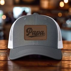 *Add some personality to your wardrobe with our leather patch hat design. *60% cotton/ 40% polyester, 100% polyester mesh backed trucker snapback cap, faux-leather laser engraved patch *Structured six-panel, mid-profile with pre-curved bill and adjustable plastic snapback closure *One size first most. Hat sizing: 7 - 7 3/4 inches, crown height approx 6 1/2 " *Faux-leather patches are engraved in the USA Outdoor Brown Snapback Hat With Letter Print, Brown Flat Bill Trucker Hat For Father's Day, Brown Curved Brim Trucker Hat For Father's Day, Brown Curved Bill Hat With Letter Print, Father's Day Brown Curved Brim Hat, Father's Day Snapback Trucker Hat With Leather Patch, Father's Day Snapback Hat With Leather Patch, Brown Trucker Hat For Father's Day Outdoor, Father's Day Brown Snapback Hat With Flat Bill