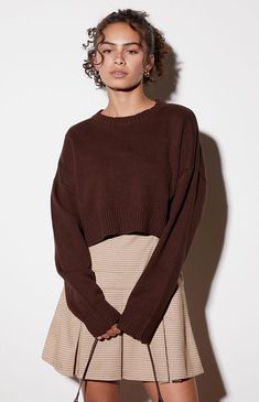 Stay cozy and stylish with the Amalia Boxy Cropped Sweater from PacSun, a must-have for your casual collection. Featuring a classic crew neckline, long sleeves, ribbed trimming, and a trendy boxy cropped fit, this sweater offers both comfort and a modern edge.Knit fabricLong sleevesCrew necklineRibbed trimmingBoxy cropped fit60% cotton, 40% acrylicModel is wearing a size small LA Hearts Womens Amalia Boxy Cropped Sweater - Brown size Large Brown Clothes Women, Crop Sweater Outfit, Cropped Sweater Outfit, Sweaters Cropped, Levi Mom Jeans, Brown Knit Sweater, Boxy Sweater, Sweater Brown, Sweater Crop