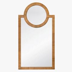 a mirror that is on top of a wooden frame with a circular mirror in the middle