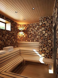 a wooden sauna with logs stacked on the wall