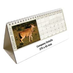 a desk calendar with an image of a gazelle