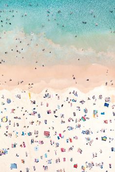 an aerial view of people at the beach