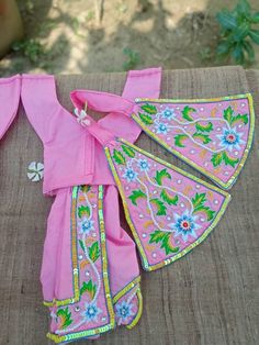 Diwali Festival Dress With Gota Work, Navratri Festival Dress With Gota Work, Pink Cotton Dress With Traditional Drape, Festive Pink Handwork Sets, Multicolor Sets With Latkans For Navratri, Multicolor Navratri Sets With Latkans, Pink Fitted Dress With Motifs, Pink Motif Sets For Diwali, Pink Diwali Sets With Motifs