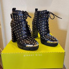 Black Leather With Metal Studs In A Size 9 Black Ankle Heeled Boots With Rivets, Black Riveted Ankle Boots, Party Boots With Grommets And Round Toe, Black Heels With Rivets For Party, Black Riveted Heels For Party, Black Rivets Heels For Party, Leather High Heel Heels With Rivets, Leather High Heels With Rivets, Black High Heel Boots With Rivets