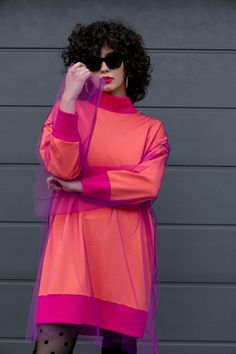 🍒 Unique oversized avant garde loose fit winter dress for Fall Winter Season cut in a lovely cotton sweatshirt fabric, decorated with separate tulle dress above. The color combination in coral, pink and purple gives this long sleeve sweater dress fresh, chic and unique look! Style it with moto boots, over the knee boots or sneakers. 🍒 Color: Coral, Pink and Purple  🍒 Length : 90 cm / 35.5 in  🍒 Fabric : Cotton Sweatshirt Fabric and Tulle  🍒 Please take a look at our size chart to ensure per Pink And Purple Dress, Colorful Fits, Sweater Dress Fall, Tulle Fashion, Colour Blocking Fashion, Dress For Fall, Unique Color Combinations, Fall Dress, Sweatshirt Fabric