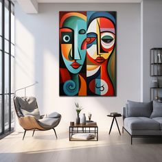 a living room with two abstract paintings on the wall