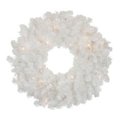 a white wreath with lights on it