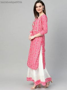 HAND CRAFTED KURTA DESCRIPTION *Pink and white bandhani print kurta with skirt *Pink and white bandhani print calf length straight kurta with foil print detail, has a tie-up neck, three-quarter sleeves, straight hem, side slits *White Solid skirt with gotta patti detail, has an elasticated waistband, slip-on closure, flared hem *Fabric:- Top fabric: Pure Cotton Bottom fabric: Pure Cotton *Wash Care:- Hand Wash AVAILABLE IN 6 SIZES THEY ARE IN FOLLOWING MEASUREMENTS IN INCHES:- XS:- Bust-34/Shoul Indian Dress For Women, Kurta With Skirt, Dhoti Pants For Men, Sleeveless Blouse Saree, Kurta Sets For Women, Indian Dresses For Women, Indian Tops, Bandhani Print, Kurti For Women