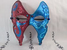 A unique hand-painted & hand-decorated carnival mask. Hand-painted paper base mask by artist Sarah Tomlinson, The Girl with many Secrets. Decorated with jewels, sequins & rhinestones and brushed with a final sparkle layer. Coated twice with a final varnish finish. Backers glued on back of mask, so surface of the mask does not sit directly on face. Elastic used to secure mask on face. Artist signature "The Girl" on back. Please check out Girl with many Secrets Etsy shop for more masks, artwork & Handmade Halloween Festival Masquerade Mask, Handmade Fantasy Masks And Prosthetics For Carnival, Fantasy Masks For Carnival And Festivals, Handmade Fantasy Costume Masks, Fantasy Carnival Mask For Festivals, Artistic Masks For Costume Party And Festivals, Artistic Masks And Prosthetics For Mardi Gras Carnival, Artistic Masks For Festivals And Costume Parties, Fantasy Masks And Prosthetics For Carnival Festival