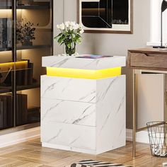 a white and yellow desk in a room