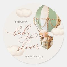 a baby shower sticker with a hot air balloon