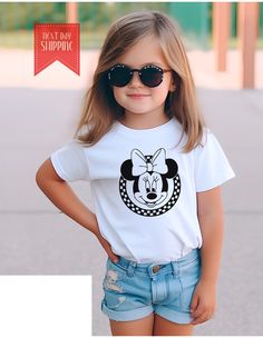 This listing is for the super cute Retro Classic Checkered Minnie  tee shirt . Lil Cute Tess Co uses Rabitt Skins brand tee shirt , they are super quality cotton shirt . The design is directly printed on to the tee shirt  using safe eco-friendly inks.  PRODUCTION TIME AND SHIPPING -All orders next business day. Cute Tshirts, Gender Neutral Baby, Baby Bodysuit, Cotton Shirt, Super Cute, Baby Clothes, Tee Shirts, Kids Outfits, T Shirt