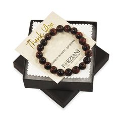 Our spiritual Himalayan Beads bracelets are meticulously handcrafted using high grade certified natural gemstones. Meaningful and healing, powers of our precious and semi-precious gemstones are enhanced by a purification process to maximize their spiritual powers. Discover unique mens designs in powerful gemstones for an immediately uplifting statement of spirits and style. Iron Tiger Eye beads, 10mm Stretch Bracelet Sleek gift box included Iron Tiger Eye is a stone of strength, stamina and cour Brown Spiritual Hand-strung Stretch Bracelet, Tigers Eye Beaded Bracelet, Brown Faceted Spiritual Beads, Tiger's Eye Bracelet, Tiger Stone Bracelet, Red Tigers Eye, Gift Box Packaging, Tigers Eye Gemstone, Meaningful Jewelry