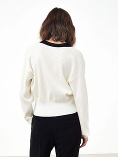 MO&Co. Women's Ribbed Knit Contrasting Cardigan Features : - Loose fit, drop shoulder- Ribbed knit finish- Contrasting design Code: MBB3CART04The back length of size S is 49.5cmMATERIALS & CARE Material: 72.8% Lyocell 27.2% PolyesterNot water wash, do not bleachSpread out in the shade to dry, do not tumble dryLow temperature iron, professional dry cleaningNotice:1. Wrap the metal parts before dry cleaning2. Ironing the padded cloth in the contrasting color partPlease select your own size in the Beige Cardigan, The Shade, Black Cardigan, Drop Shoulder, Contrasting Colors, Ribbed Knit, Loose Fitting, Knitting, Water