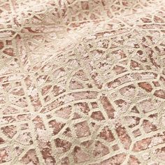 a close up view of an intricate design on a piece of fabric with no pattern